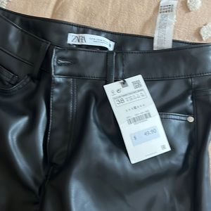 Zara Women’s black faux leather pants, flare style